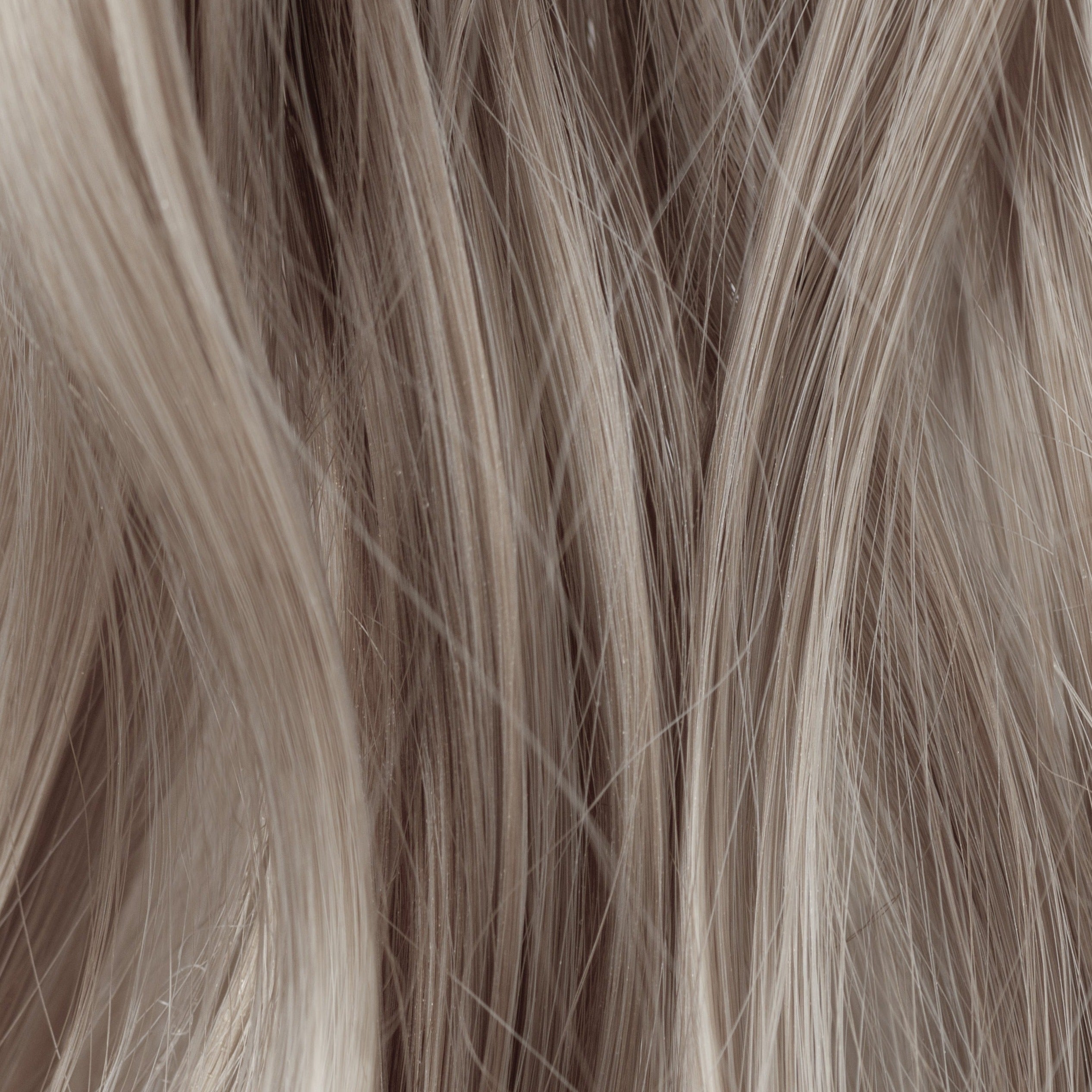 gray-curly-hair-texture-closeup-light-gray-hair-background.jpg